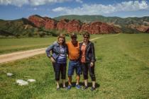 Guest from USA on background of rock Seven Bulls