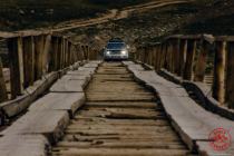 Crossing old bridge through Kara-Say river